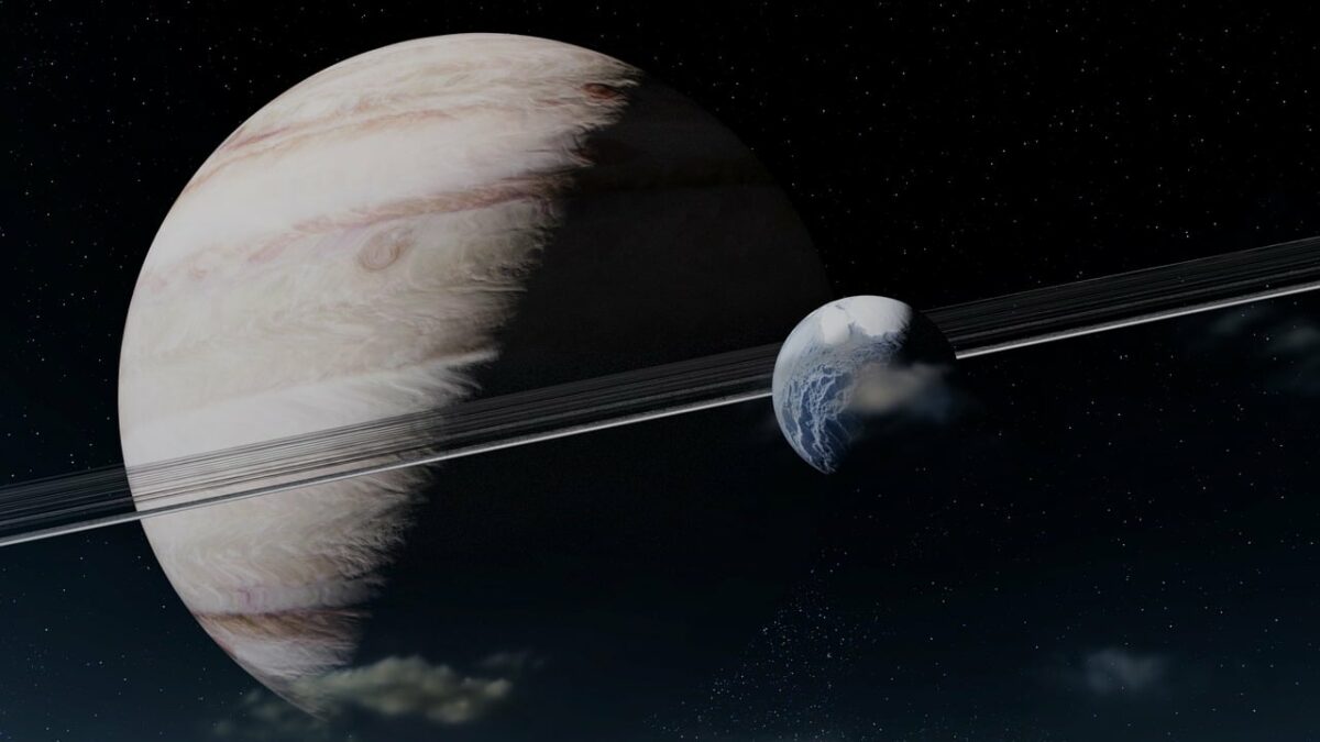 Uranus next to Jupiter in space